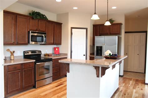 Another Example Of Mixed Wood Colors And Finishes In The Kitchen