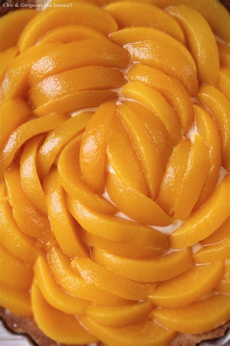 chic and gorgeous treats peach custard tart with lemon thyme syrup glaze