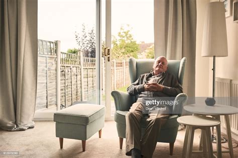 Senior Man Sleeping On A Armchair High Res Stock Photo Getty Images