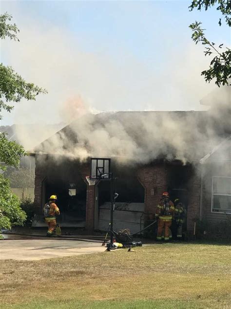 Firefighters Working To Put Out House Fire In Jackson