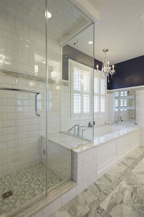 If space is tight, consider a fixed, folding or sliding shower door. Glass enclosed shower with bench connected to the platform ...