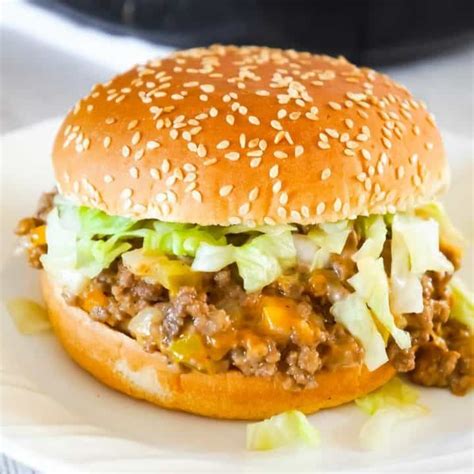 These sloppy joes are loaded with onions, pickles and cheddar cheese all tossed in a copycat big mac sauce. Big Mac Sloppy Joes are an easy ground beef dinner recipe ...