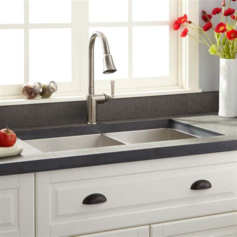 Small undermount bathroom sinks are available in a variety of sizes and shapes, meaning you will be able to find one that fits perfectly in your bathroom countertop. 33" Executive Zero-Radius 60/40 Offset Double-Bowl ...