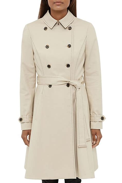 A Beige Trench Coat Is The Ultimate Wardrobe Essential Trench Coats