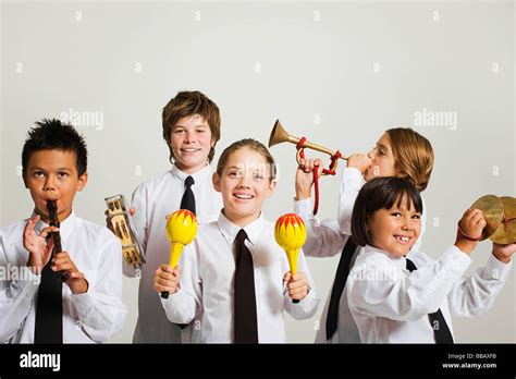 Kids Playing Musical Instruments Stock Photo Alamy