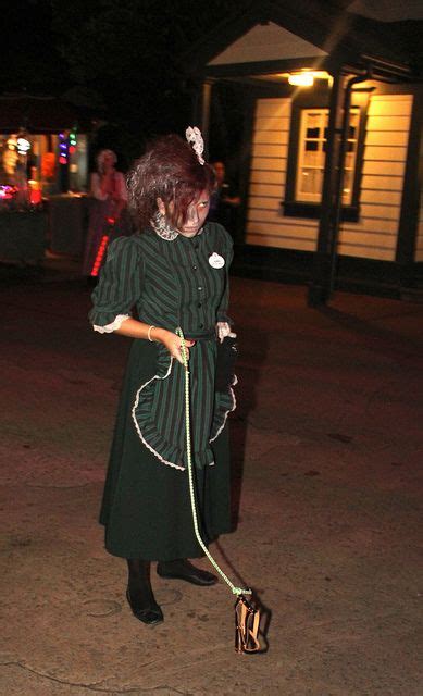 Haunted Mansion Maid Walking Ghost Dog By Insidethemagic Via Flickr