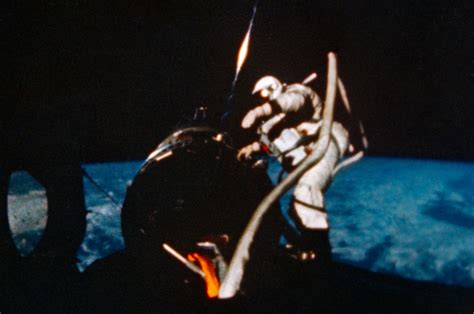 Gemini 12 Aldrin Shown Working At The Agena During His Umbilical Eva
