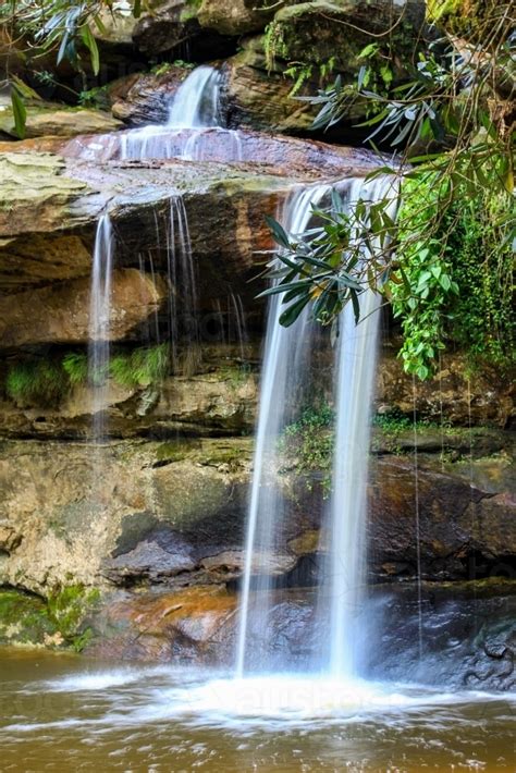 Image Of Water Flowing Over Rocky Waterfall Austockphoto
