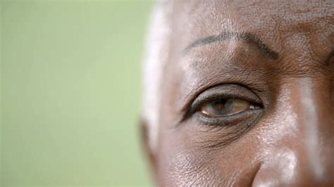 Senior Black Woman Portrait Closeup Of Eye Mouth And Face Of Happy