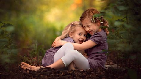 Little Girl Children Hugging Smiling Depth Of Field Wallpapers Hd