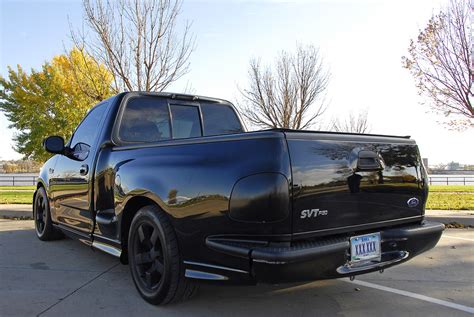 When ford wouldn't build this supercharged tribute pickup truck, a kansas dealership did. FS: Murdered-Out Built Turbo Lightning