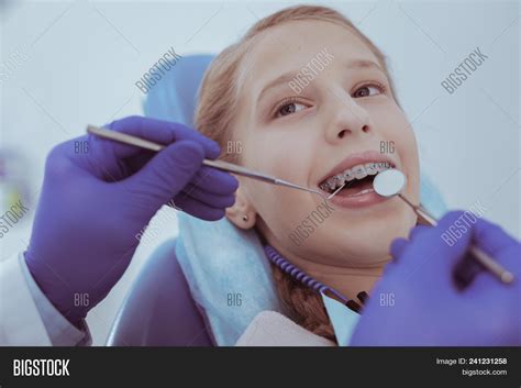 Annual Checkup Positive Vigorous Girl Opening Mouth While Male
