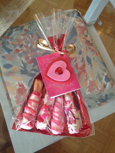 Strawberry Cream Chocolate Covered Pretzels With Sprinkles