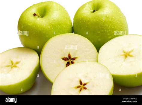 Apples Cut Into Halves And Whole Stock Photo Alamy