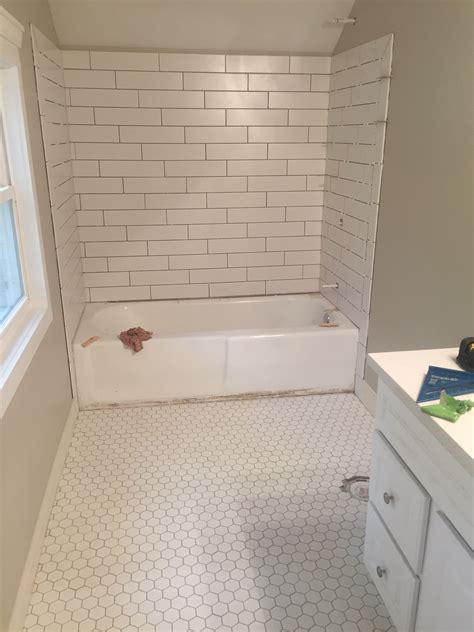 Installing Tile In The Upper Bathing Room A 2 White Hexagon Floor