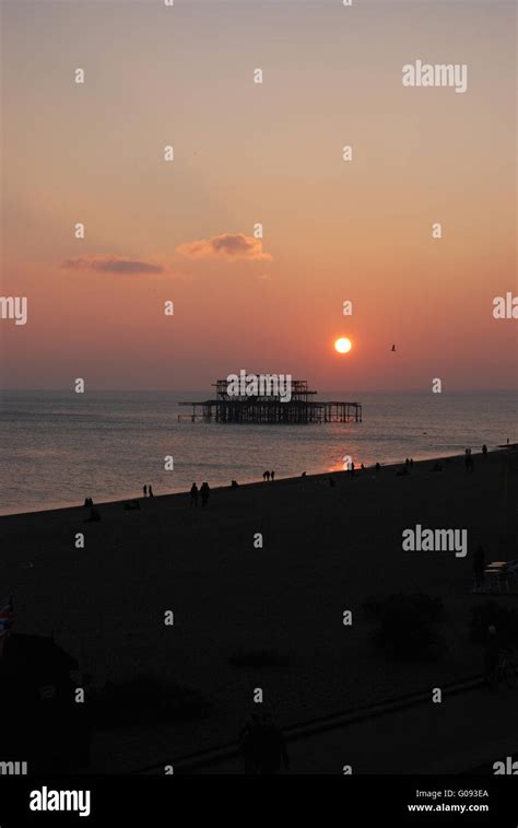 Sunset Over West Pier Brighton Stock Photo Alamy
