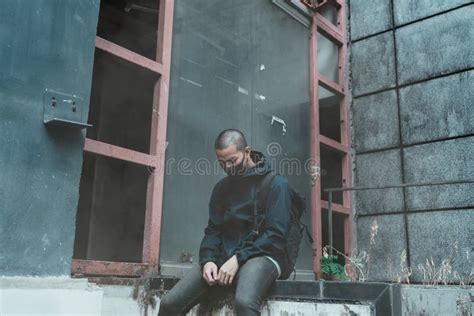 Man Sitting With Hopeless In Dark City Stock Photo Image Of Anxious