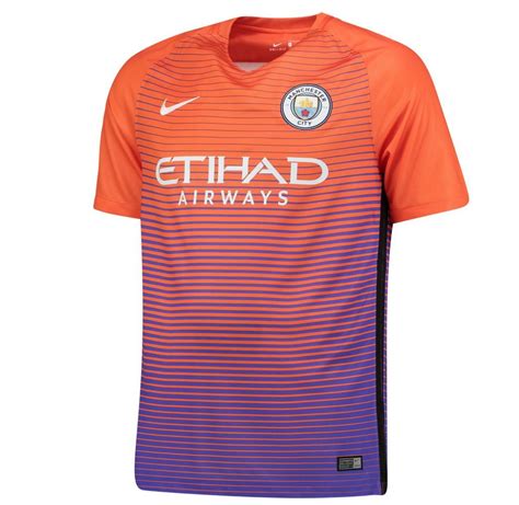 Manchester City Reveal Bright Orange And Violet Third Kit