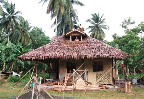 Concrete block lower walls, amakan uppers and nipa roof. A Step-by-Step Guide in Building Bahay Kubo - Balay.ph