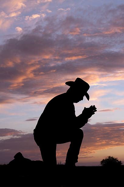 Praying Cowboy Stock Photos Pictures And Royalty Free Images Istock