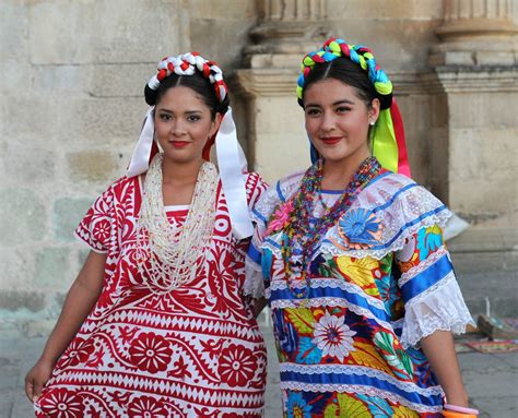 Women Of Oaxaca Mexico Two Women Wearing Beautiful Typical Huipiles Attend Guests At A Wedding