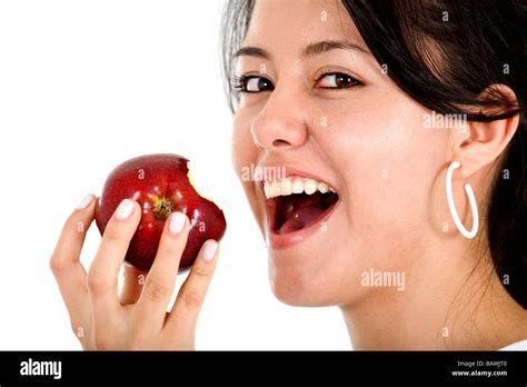 Girl Eating Apple Over White Stock Photo Alamy