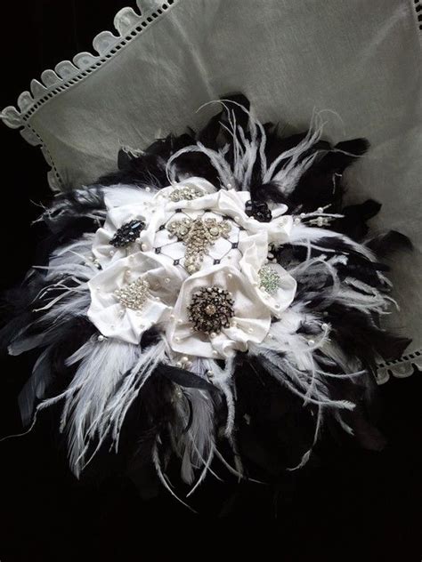 The most common red and black feather brooch material is glass. Broach Bouquet - Brooch Bouquet - Bridal Bouquet - Jeweled ...