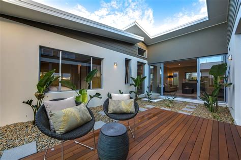 Colours displayed should be used as a guide for your colour selection. Colorbond Surfmist, Woodland Grey & Dulux Brown Fig ...