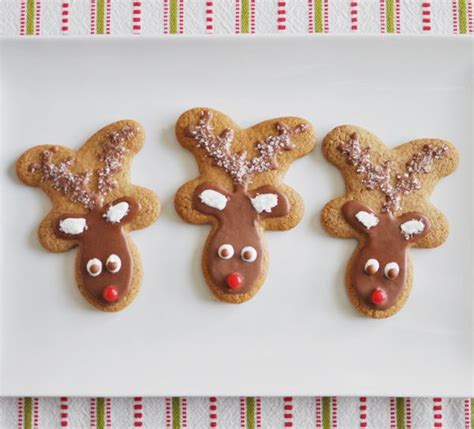 If desired, decorate with raisins, currants or cinnamon red hot candies for eyes and buttons. I the idea of using an upside-down gingerbread man cookie cutter as a reindeer!! | Reindeer ...