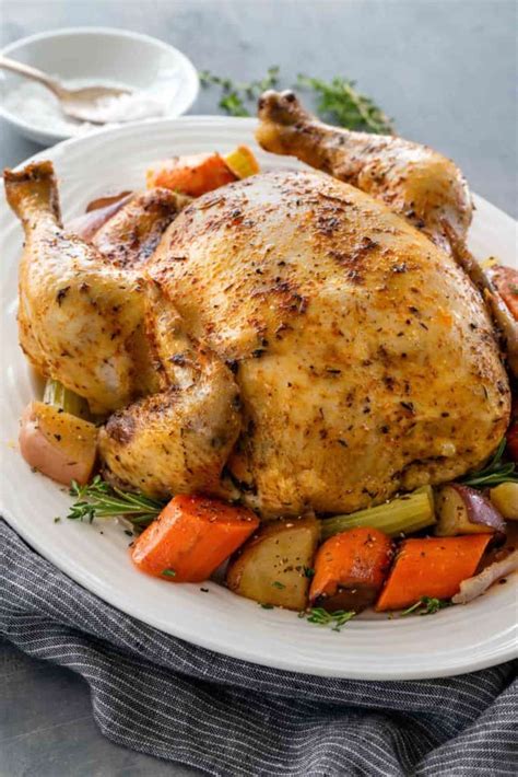 Cover it with water and add any veg you have handy. Slow Cooker Whole Chicken - Cafe Delites