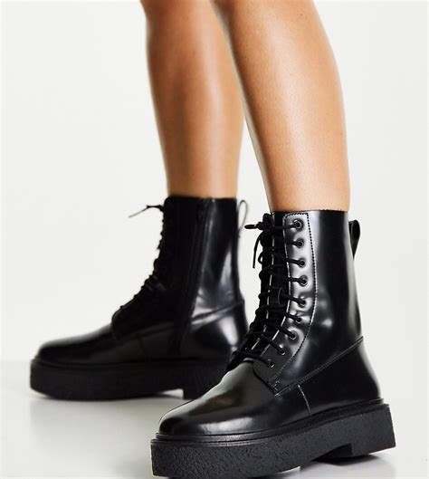 asos design wide fit acolade flat lace up boots in black modesens