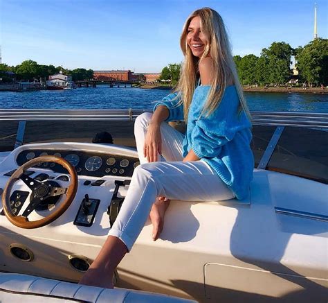 1920x1080px 1080p free download anjelica ebbi enjoying a boat ride pale blue sweater white