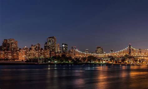 Timelapse filmmakers gavin heffernan and harun mehmedinovic created this surreal composite timelapse that combines the pristine skies over death valley and the grand canyon with the bustling streets of new york city. Photos New York City USA Bridges Sky Night Cities 2000x1200