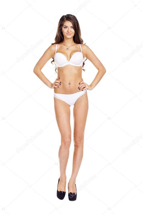 Full Length Beautiful Slim Tanned Woman In Bikini Isolated On W