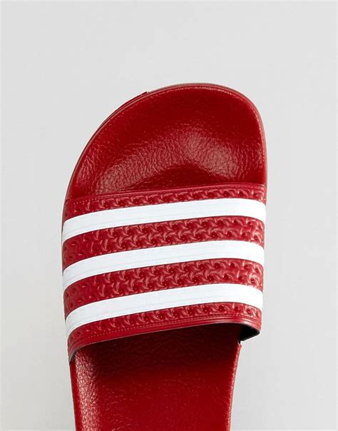 Adidas Originals Adilette Slides In Red Lyst
