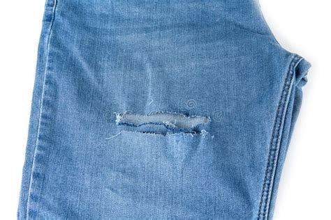 Hole In Blue Jeans Fixed With Safety Pins Stock Image Image Of Hole Fixed