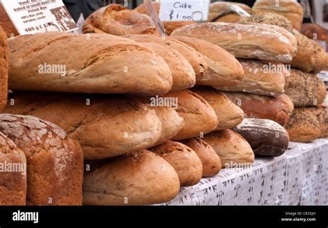 Loaves Of Fresh Bread Stacked At A Market Stock Photo Alamy