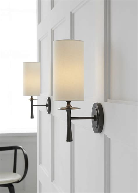Forgo table lamps on the nightstands, and position wall sconces beside. hallways with sconce lighting - Google Search (With images ...