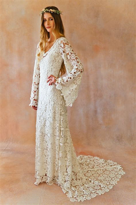 A lace wedding dress with sleeves will also help display the beauty and intricacy of the lace pattern itself. Boho Crochet Style Lace Gown with Bell Sleeves | Dreamers ...