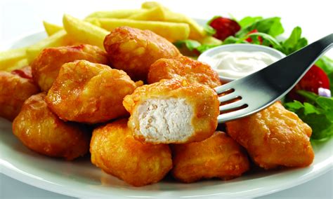 A chicken nugget is 61% bread and fat, 39% chicken. You Can Now Get Paid To Eat Chicken Nuggets, Fish Fingers ...