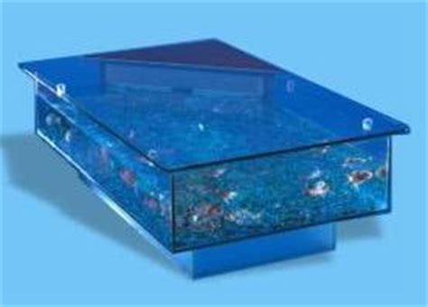We want to believe in everything they say … because we like it. Coffee Table Aquarium by Aqua Design