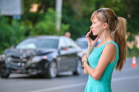 Stressed Woman Driver Talking On Mobile Phone On Street Side Calling
