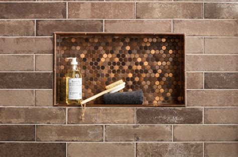 Knowing the right bathroom tile patterns and types will help you choose the perfect ones to. copper brick wall with shower niche. | Tile layout ...