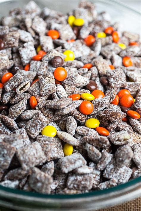Place the chex in a large ziplock bag or bowl, and pour the chocolate peanut butter mixture over top. Halloween Puppy Chow | The Rustic Foodie