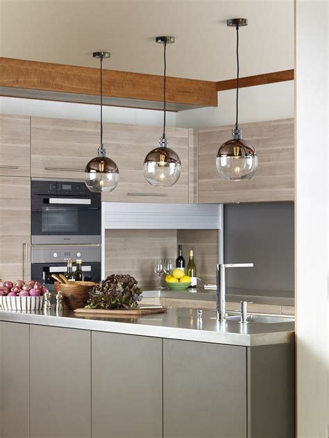 Our Rue Easy Fit Pendant Features A Glass Shade With A Bronze Top And