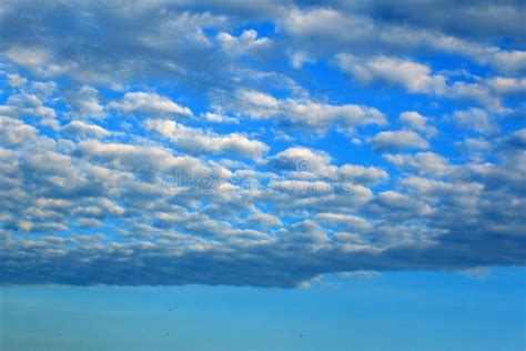 Dramatic Bright Blue Sky And White Clouds Pattern Background Stock