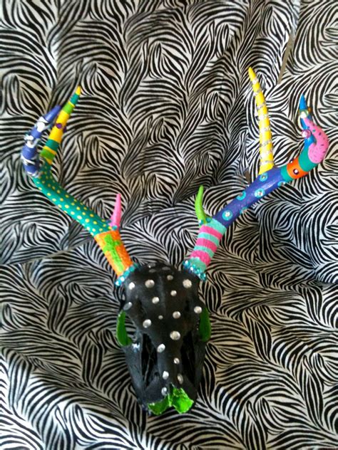 Hand Painted Deer Skull Or Wrap With Colorful Yarn On The Ribbons