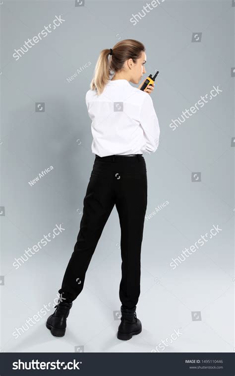 Female Security Guard Uniform Using Portable Stock Photo 1495110446