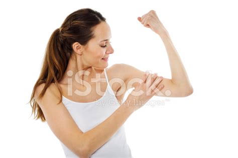 Woman Showing Muscle Bicep Stock Photo Royalty Free Freeimages