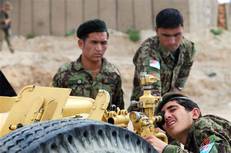 An Afghan Soldier Adjusts The Equipment On A D 30 Howitzer On Forward